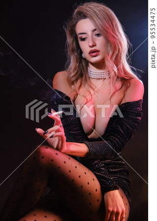 luxury woman smoking luxury woman smoking 95534475