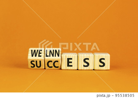 Wellness for success symbol. Concept words Wellness and Success on wooden cubes. Beautiful orange table orange background. Business wellness for success concept. Copy space. Wellness for success symbol. Concept words Wellness and Success on wooden cubes. Beautiful orange table orange background. Business wellness for success concept. Copy space. 95538505