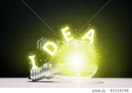 The concept of creativity and idea generation. Light bulb glowing with text. The concept of creativity and idea generation. Light bulb glowing with text. 95539288