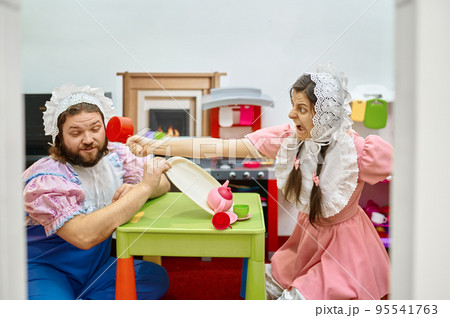 Babies fight, mad girl beating boy 95541763