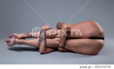 Photo of the woman hugged straight legs 95544745