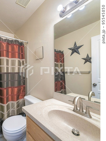 Vertical Traditional small bathroom interior with satin shower curtain Vertical Traditional small bathroom interior with satin shower curtain 95545850
