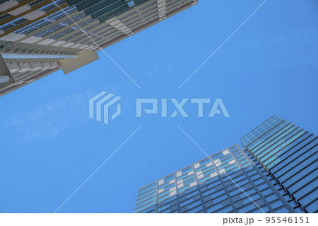 Two buildings facing each other in a low angle view at Austin, Texas Two buildings facing each other in a low angle view at Austin, Texas 95546151