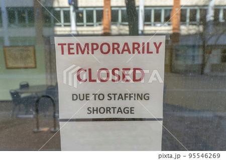 San Antonio, Texas- Selective focus of a signage with Temporarily Closed Due to Staffing Shortage San Antonio, Texas- Selective focus of a signage with Temporarily Closed Due to Staffing Shortage 95546269