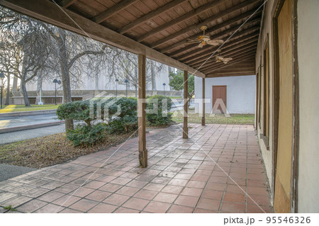 Front porch of an old historic and abandoned building in San Antonio Texas 95546326