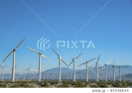 Windmills or high wind turbines that generates renewable electricity Windmills or high wind turbines that generates renewable electricity 95546634