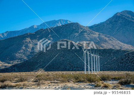 Palm Springs, California- Wind turbines on a desert at the mountainside Palm Springs, California- Wind turbines on a desert at the mountainside 95546835