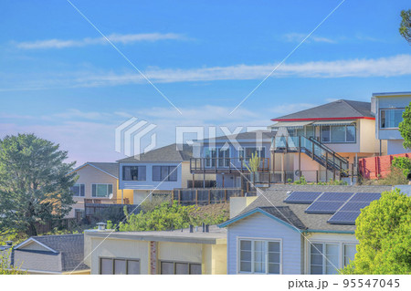 House with solar panels on the roof in San Francisco California neighborhood 95547045