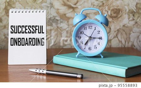 A symbol of successful adaptation. On the notebook the text Successful adaptation.  95558893