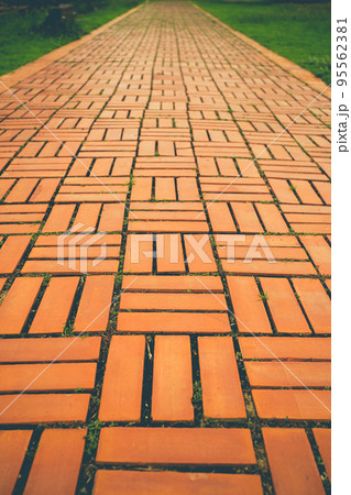 Selective focus shot of many bricks walkway. Selective focus shot of many bricks walkway. 95562381