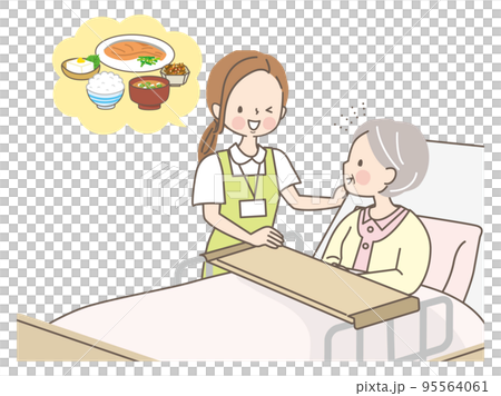 A caregiver helping a senior woman eat 95564061
