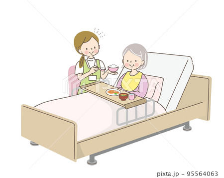 シニア女性に食事を介助する介護士 95564063