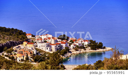 Croatian village on a peninsula near Primosten on the Mediterranean Sea Croatian village on a peninsula near Primosten on the Mediterranean Sea 95565991
