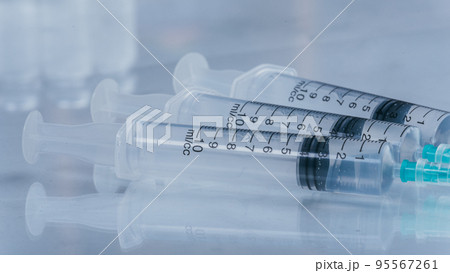 Medicine, Injection, vaccine and disposable syringe isolated, drug concept. Sterile vial medical. Macro close up on backgrounds gray. Medicine, Injection, vaccine and disposable syringe isolated, drug concept. Sterile vial medical. Macro close up on backgrounds gray. 95567261