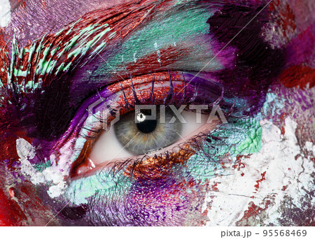 Crop of female eye with colorful make up Crop of female eye with colorful make up 95568469