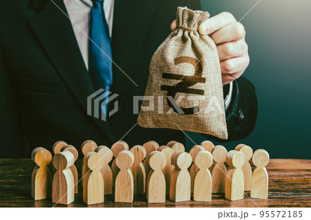 Businessman holds out a ukrainian hryvnia money bag to the crowd. Official. Compensation payments. Providing money, paying salaries and grants. Staff maintenance. Financial support. Tax collection. 95572185