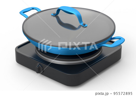 Frying pan or wok with glass lid on portable camping electric stove 95572895