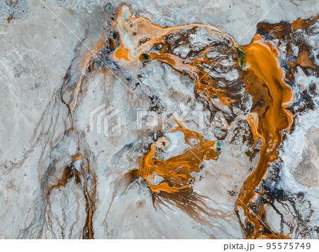 Beautiful geysers with hot water and steam with pools of thermophilic bacteria in the Upper Geyser Basin of Yellowstone National Park, Wyoming, United States. Beautiful geysers with hot water and steam with pools of thermophilic bacteria in the Upper Geyser Basin of Yellowstone National Park, Wyoming, United States. 95575749