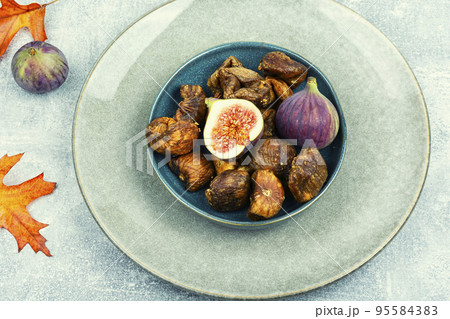Candied dried and fresh figs. 95584383
