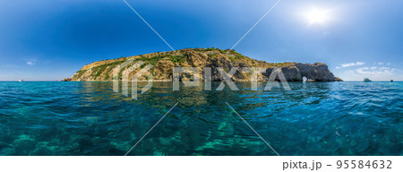 Yachts in the Sea on a background of rocky shores. The concept of an travel, relax, active and healthy life in harmony with nature. Diana's grotto in Sevastopol. Fiolent, Crimea 95584632