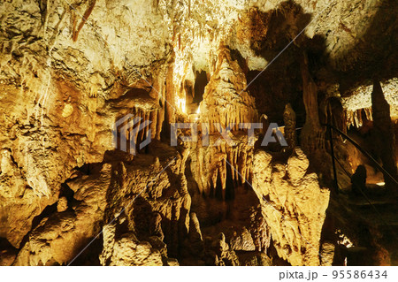 Stalagtites in a gigantic vertical stalactite cave in the mountains of Istria, Croatia Stalagtites in a gigantic vertical stalactite cave in the mountains of Istria, Croatia 95586434