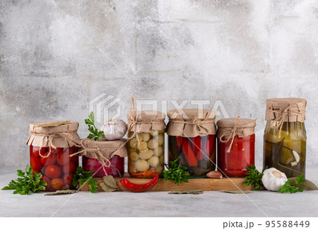 Pickled vegetables in glass jars. Pickled vegetables in glass jars. 95588449