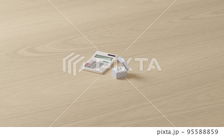 平面上に置かれた2つの結婚指輪を収めたケースと白い電卓の3Dレンダリングイラスト 95588859