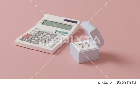 平面上に置かれた2つの結婚指輪を収めたケースと白い電卓の3Dレンダリングイラスト 95588883