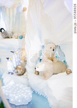 Christmas decor. Polar polar bears on an artificial iceberg in a cave 95588926