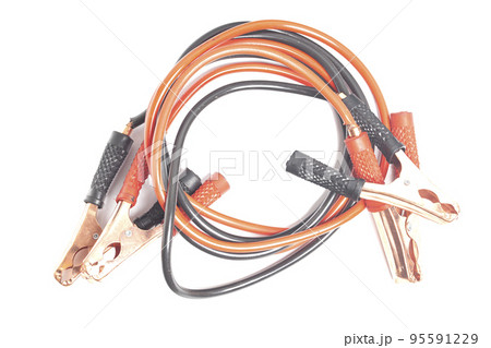 Car battery jumper cables isolated on white background. Car battery jumper cables isolated on white background. 95591229