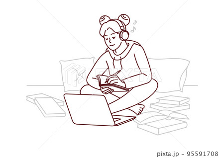Girl in headphones study on laptop at home Girl in headphones study on laptop at home 95591708