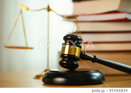 Lawyer or judge's hammer in the court. Auction's hammer and judgement golden scale are on wood table. Law subject. Judgement subject to judge people. Lawyer or judge's hammer in the court. Auction's hammer and judgement golden scale are on wood table. Law subject. Judgement subject to judge people. 95593834