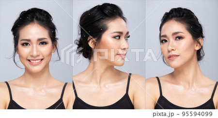 Half body face shot 20s Asian Woman has beautiful wedding clean face skin. Black long straight hair female feel happy smile fashion vintage poses over grey background isolated Half body face shot 20s Asian Woman has beautiful wedding clean face skin. Black long straight hair female feel happy smile fashion vintage poses over grey background isolated 95594099