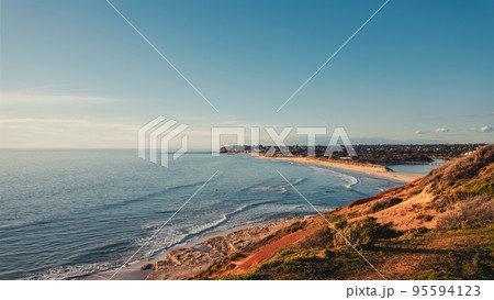 Port Noarlunga rugged coastline at sunset Port Noarlunga rugged coastline at sunset 95594123