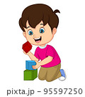 Cute little boy playing with building blocks 95597250