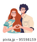 a red-haired woman and a curly-haired guy love and show their hearts with their hands. happy couple married and happy 95598159