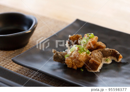 Close up of Crispy Fish Skin Close up of Crispy Fish Skin 95598377