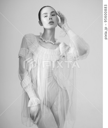 Sexy model in transparent dress. 95600883