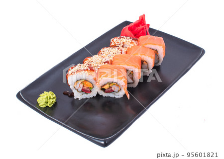 Japanese seafood Sushi roll isolated on white close up. Japanese food restaurant, sushi maki gunkan roll plate or platter set. Maki Sushi rolls with salmon and avocado. Sushi isolated at white Japanese seafood Sushi roll isolated on white close up. Japanese food restaurant, sushi maki gunkan roll plate or platter set. Maki Sushi rolls with salmon and avocado. Sushi isolated at white 95601821