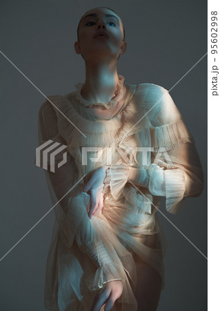 Sexy model in transparent dress. 95602998