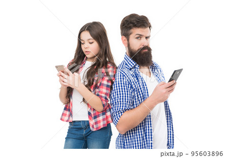 Phone addicts. Father and daughter use mobile phones. Smartphone addicts. Nomophobia 95603896