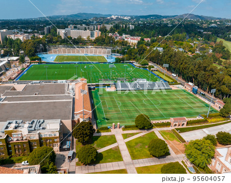 Aerial view of the Football stadium at the University of California, Los Angeles, UCLA. Royce Hall is one of four original buildings of the UCLA campus. Aerial view of the Football stadium at the University of California, Los Angeles, UCLA. Royce Hall is one of four original buildings of the UCLA campus. 95604057