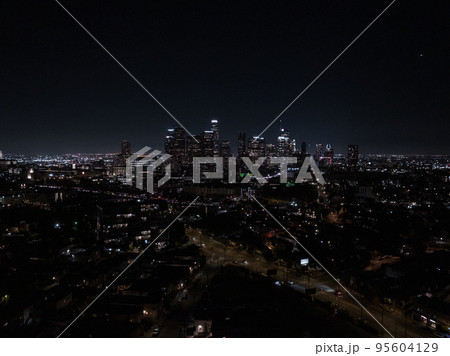 View of Downtown Los Angeles from the Hollywood Hills. Interstate 101 is shown in the foreground. 95604129