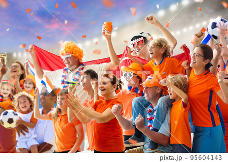 Netherlands football team supporter on stadium. 95604143