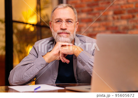 Portrait of practiced profesional elderly psychologist online remote session Portrait of practiced profesional elderly psychologist online remote session 95605672