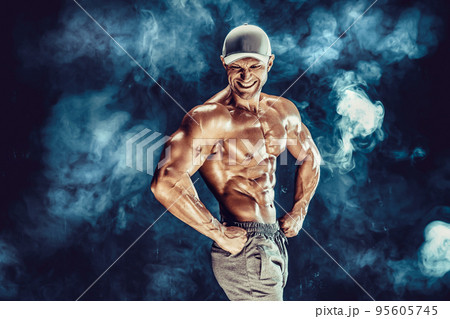 Handsome young fit muscular caucasian man of model appearance workout training, gaining weight pumping up muscle and poses fitness, bodybuilding sport nutrition concept Handsome young fit muscular caucasian man of model appearance workout training, gaining weight pumping up muscle and poses fitness, bodybuilding sport nutrition concept 95605745