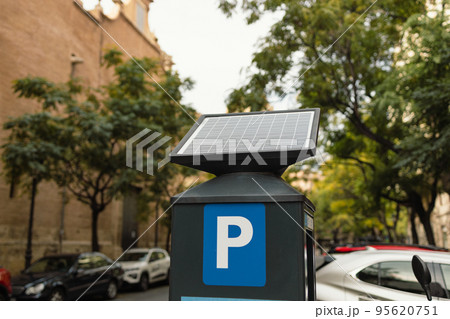 Parking machine equipped with a solar battery for recharging from Solar energy light. Electronic payment that issues a permit to parking car. Krakow, Poland 95620751