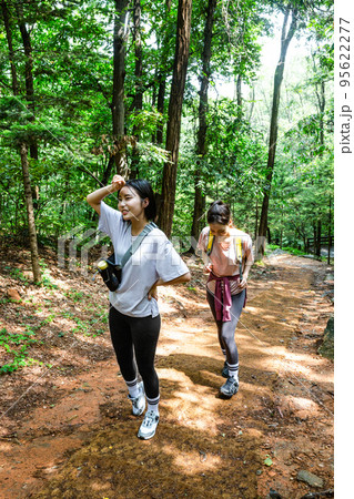 korean young women hiking and plogging_trekking mountain korean young women hiking and plogging_trekking mountain 95622277