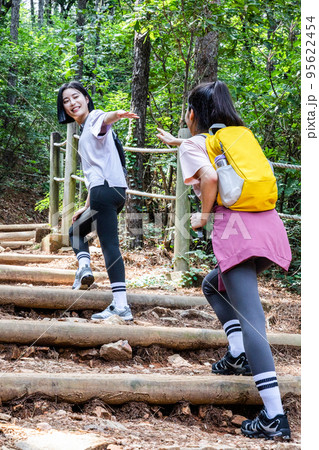 korean young women hiking and plogging_trekking mountain korean young women hiking and plogging_trekking mountain 95622454