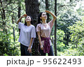 korean young women hiking and plogging_resting 95622493